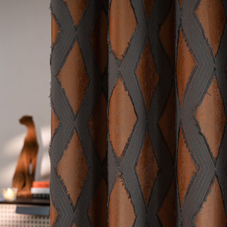 Rideau occultant géométrique terracotta orange avec motif losange et frange
